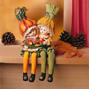 2 figurine așezate Copii dovleac imagine