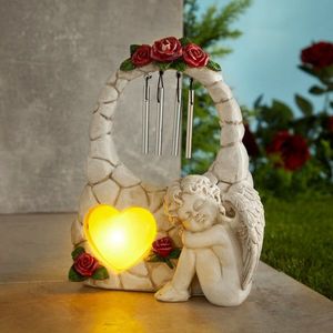 Înger solar cu clopoței eolieni imagine