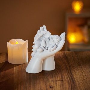 Înger în palmă imagine