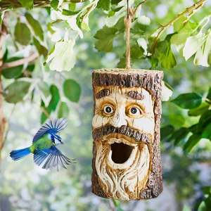 Copac cu cuib de păsări și față imagine