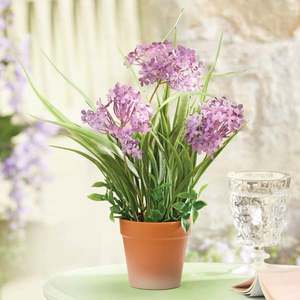 Plantă artificială într-un ghiveci imagine